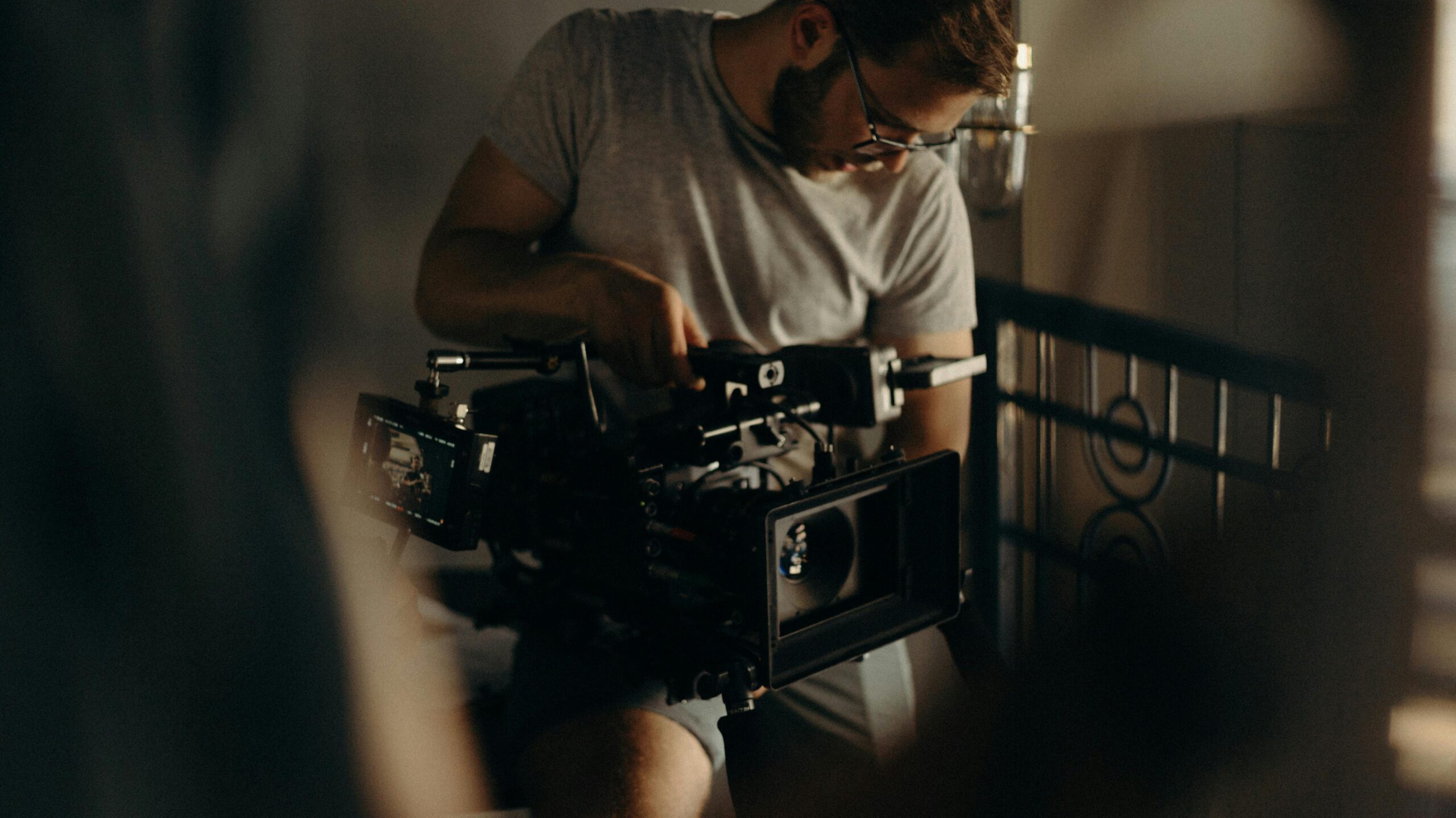 Professional videographer setting up a camera for video production in Halifax, Nova Scotia